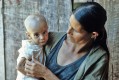 A terminally-ill child in Campo Eré, a refuge for landless farm workers in Southern Brazil.